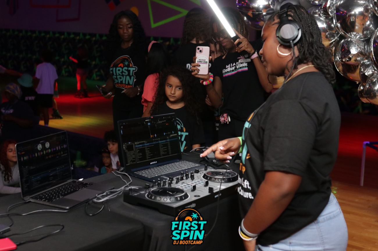 A First Spin DJ Bootcamp student learning to DJ